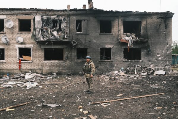 epa11336743 A Ukrainian police officer inspects a damaged building during the evacuation of local people from territories bordering Russia, in the city of Vovchansk, Kharkiv region, northeastern Ukraine, 13 May 2024, amid the Russian invasion. More than 4,000 residents from settlements in areas of the Kharkiv region bordering Russia have been evacuated as 'hostilities intensified', the head of the Kharkiv Military Administration Oleg Synegubov wrote on telegram. The evacuations follow a cross-border offensive by Russian forces, who claimed the capture of several villages in the region. Russian troops entered Ukrainian territory on 24 February 2022, starting a conflict that has provoked destruction and a humanitarian crisis.  EPA/GEORGE IVANCHENKO