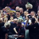 epa11351889 Oleksandr Usyk of Ukraine poses with the Undisputed Heavyweight title belt after winning against Britain's Tyson Fury in Riyadh, Saudi Arabia, 18 May 2024.  EPA/ALI HAIDER