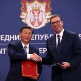epa11326519 Serbian President Aleksandar Vucic (R) and Chinese President Xi Jinping (L) shake hands after signing an agreement of understanding between Serbia and China in Belgrade, Serbia, 08 May 2024. The Chinese president is on a two-day official visit to Serbia.  EPA/ANDREJ CUKIC