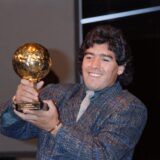 Diego Maradona poses with the Ballon d'Or at the Lido in Paris on November 13, 1986. He was awarded following the 1986 FIFA World Cup. The Golden Ball award is presented to the best player at each FIFA World Cup finals.,Image: 800969633, License: Rights-managed, Restrictions: , Model Release: no, Credit line: Pascal GEORGE / AFP / Profimedia