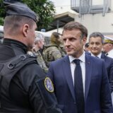 French President Emmanuel Macron visits the central police station with France's Minister for Interior and Overseas Gerald Darmanin (R) in Noumea, France's Pacific territory of New Caledonia on May 23, 2024. France's president made a long-haul trip to the restive Pacific territory of New Caledonia on on May 23, urging a "return to peace" after deadly rioting, and vowing thousands of military reinforcements will be deployed for "as long as necessary".,Image: 875675314, License: Rights-managed, Restrictions: , Model Release: no, Credit line: Ludovic MARIN / AFP / Profimedia