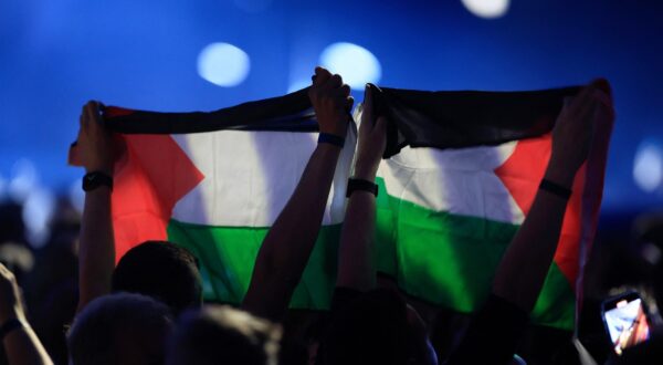 Members of the audience hold up Palestinian flags during the final dress-rehearsal of the 68th edition of the Eurovision Song Contest (ESC) at the Malmo Arena, in Malmo, Sweden, on May 11, 2024. Dutch contestant Joost Klein was dropped from the Eurovision final just hours before the event following an incident unlinked to the controversy over Israel's participation amid the Gaza war.,Image: 871994950, License: Rights-managed, Restrictions: Sweden OUT, Model Release: no, Credit line: Andreas HILLERGREN / AFP / Profimedia