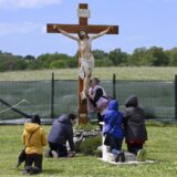 Italy, Trevignano - May 3, 2023.Crucifix next to the he statue of the Madonna of Trevignano. For almost five years, the Madonna of Trevignano on Lake Bracciano has been crying tears of blood, on the 3rd of each month.La Madonna di Trevignano al Campo delle Rose.,Image: 773761295, License: Rights-managed, Restrictions: * France, Germany and Italy Rights Out *, Model Release: no, Credit line: Mistrulli/Fotogramma / Zuma Press / Profimedia