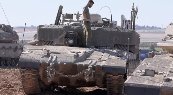 KEREM SHALOM CROSSING, May 8, 2024  -- Israeli armored vehicles are deployed near the Kerem Shalom crossing in southern Israel, on May 8, 2024. Israel's army announced on Wednesday that it was continuing its ground assault on Gaza's Rafah, reporting approximately 30 casualties since the offensive began on Monday night. According to an army statement, the 30 casualties were militants, while Gaza health officials reported about 35 deaths, including a four-month-old baby.,Image: 871260503, License: Rights-managed, Restrictions: , Model Release: no, Credit line: Ilan Assayag/JINI / Xinhua News / Profimedia
