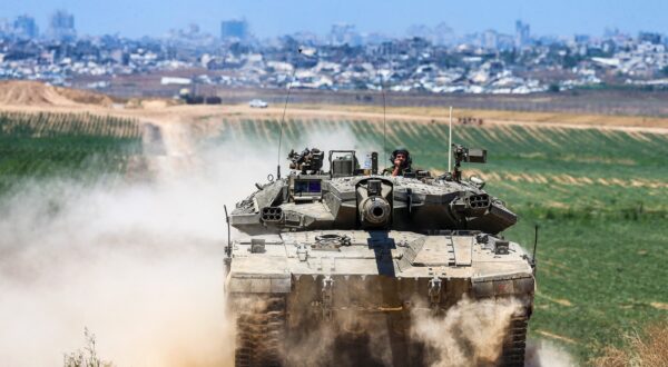 An Israeli army battle tank moves near the border with the Gaza Strip in southern Israel on May 16, 2024, amid the ongoing conflict between Israel and the militant group Hamas. Five Israeli paratroopers were killed and several injured when an Israeli tank fired on them in the latest friendly-fire incident during the country’s war against Hamas militants in the Gaza Strip. The Israel Defense Forces said on Thursday that a tank fired twice at the troops, with an initial review showing that it was likely the result of misidentification during fierce fighting with “Hamas in a dense urban area” in Jabalia. IDF troops have returned to the ruins of the northern Gaza refugee camp a few months after Israel had declared the area cleared of Hamas fighters.,Image: 873766002, License: Rights-managed, Restrictions: , Model Release: no, Credit line: Middle East Images/ABACA / Abaca Press / Profimedia