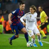 Barcelona's Croatian midfielder Ivan Rakitic (L) challenges Real Madrid's Croatian midfielder Luka Modric during the "El Clasico" Spanish League football match between Barcelona FC and Real Madrid CF at the Camp Nou Stadium in Barcelona on December 18, 2019,,Image: 488848224, License: Rights-managed, Restrictions: , Model Release: no, Credit line: LLUIS GENE / AFP / Profimedia
