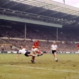 File photo dated 30-07-1966 of (L-R) West Germany's Willi Schulz challenges England's Roger Hunt, watched by teammate Karl-Heinz Schnellinger and England's Alan Ball (right).,Image: 518584511, License: Rights-managed, Restrictions: FILE PHOTO, Model Release: no, Credit line: PA Photos / PA Images / Profimedia