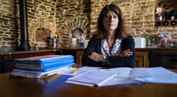 Sophie Rollet poses with her files on her research regarding the tire explosion that caused the death of her husband in 2014, at her home in Geney, eastern France, on July 9, 2020.,Image: 541983631, License: Rights-managed, Restrictions: , Model Release: no, Credit line: SEBASTIEN BOZON / AFP / Profimedia