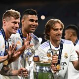 (From L) Real Madrid's German midfielder Toni Kroos, Real Madrid's Brazilian midfielder Casemiro and Real Madrid's Croatian midfielder Luka Modric pose with the trophy after winning the UEFA Champions League final football match between Liverpool and Real Madrid at the Stade de France in Saint-Denis, north of Paris, on May 28, 2022.,Image: 695348995, License: Rights-managed, Restrictions: , Model Release: no, Credit line: Anne-Christine POUJOULAT / AFP / Profimedia