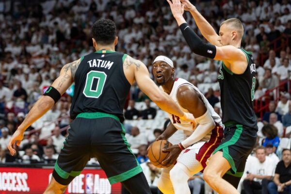 April 29, 2024: Miami Heat center Bam Adebayo (13) tries to score as Boston Celtics center Kristaps Porzingis (8) and forward Jayson Tatum (0) defend in the first half of Game 4 of an NBA basketball first-round playoff series at the Kaseya Center on Monday, April 29, 2024, in Miami.,Image: 869030540, License: Rights-managed, Restrictions: , Model Release: no, Credit line: Matias J. Ocner / Zuma Press / Profimedia