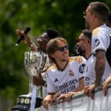 May 12, 2024, Madrid, Spain: Luca Modric (C) of Real Madrid seen during the celebration of their 36th League title. Real Madrid Football Club celebrated with its fans the achievement of its 36th Spanish League. As tradition, they have celebrated next to the statue of the Goddess Cibeles located in the Plaza de Cibeles in Madrid.,Image: 872376283, License: Rights-managed, Restrictions: , Model Release: no, Credit line: David Canales / Zuma Press / Profimedia