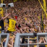 Die Fans feiern ihren Kapitaen Marco Reus Borussia Dortmund 09, 11, GER BVB Borussia Dortmund 09 vs. SV Darmstadt 98, Fussball, Bundesliga, Spieltag 34, Saison 2023/2024, 18.05.2024 DFB/DFL REGULATIONS PROHIBIT ANY USE OF PHOTOGRAPHS AS IMAGE SEQUENCES AND/OR QUASI-VIDEO, GER BVB Borussia Dortmund 09 vs. SV Darmstadt 98, Fussball, Bundesliga, Spieltag 34, Saison 2023/2024, 18.05.2024 Dortmund *** The fans celebrate their captain Marco Reus Borussia Dortmund 09, 11 , GER BVB Borussia Dortmund 09 vs SV Darmstadt 98, Football, Bundesliga, Matchday 34, Season 2023 2024, 18 05 2024 DFB DFL REGULATIONS PROHIBIT ANY USE OF PHOTOGRAPHS AS IMAGE SEQUENCES AND OR QUASI VIDEO, GER BVB Borussia Dortmund 09 vs SV Darmstadt 98, Football, Bundesliga, Matchday 34, Season 2023 2024, 18 05 2024 Dortmund Copyright: xEibner-Pressefoto/FabianxFriesex EP_FFE,Image: 874246628, License: Rights-managed, Restrictions: Credit images as "Profimedia/ IMAGO", Model Release: no, Credit line: Eibner-Pressefoto/Fabian Friese / imago sportfotodienst / Profimedia