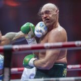 RIYADH, SAUDI ARABIA - MAY 19: Oleksandr Usyk (L) of Ukraine in action against Tyson Fury (R) of United Kingdom during heavyweight boxing world championship fight at Kingdom Arena in Riyadh, Saudi Arabia on May 19, 2024. Mohammed Saad / Anadolu,Image: 874313471, License: Rights-managed, Restrictions: , Model Release: no, Credit line: Mohammed Saad / AFP / Profimedia