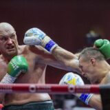 RIYADH, SAUDI ARABIA - MAY 19: Oleksandr Usyk (R) of Ukraine in action against Tyson Fury (L) of United Kingdom during heavyweight boxing world championship fight at Kingdom Arena in Riyadh, Saudi Arabia on May 19, 2024. Mohammed Saad / Anadolu,Image: 874313478, License: Rights-managed, Restrictions: , Model Release: no, Credit line: Mohammed Saad / AFP / Profimedia