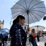 People protect themselves from the sun with an umbrella as they walk during a heat wave hitting the country in Guadalajara, Jalisco State, Mexico, on May 23, 2024.,Image: 875900248, License: Rights-managed, Restrictions: , Model Release: no, Credit line: ULISES RUIZ / AFP / Profimedia
