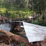 This picture shows a demolished house at the site of a landslide at Yambali Village in the region of Maip Mulitaka, in Papua New Guinea's Enga Province on May 25, 2024. Rescue teams began arriving at the site of a massive landslide in Papua New Guinea's remote highlands on May 25, helping villagers search for the scores of people feared dead under the towering mounds of rubble and mud.,Image: 876245226, License: Rights-managed, Restrictions: , Model Release: no, Credit line: STR / AFP / Profimedia