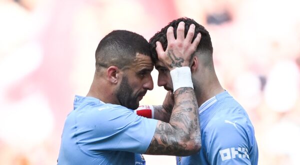 Manchester City's English defender #02 Kyle Walker (L) consols Manchester City's Croatian defender #24 Josko Gvardiol after loosing the English FA Cup final football match between Manchester City and Manchester United at Wembley stadium, in London, on May 25, 2024. Manchester United wins 2 - 1 against Manchester City.,Image: 876373965, License: Rights-managed, Restrictions: NOT FOR MARKETING OR ADVERTISING USE / RESTRICTED TO EDITORIAL USE, Model Release: no, Credit line: JUSTIN TALLIS / AFP / Profimedia