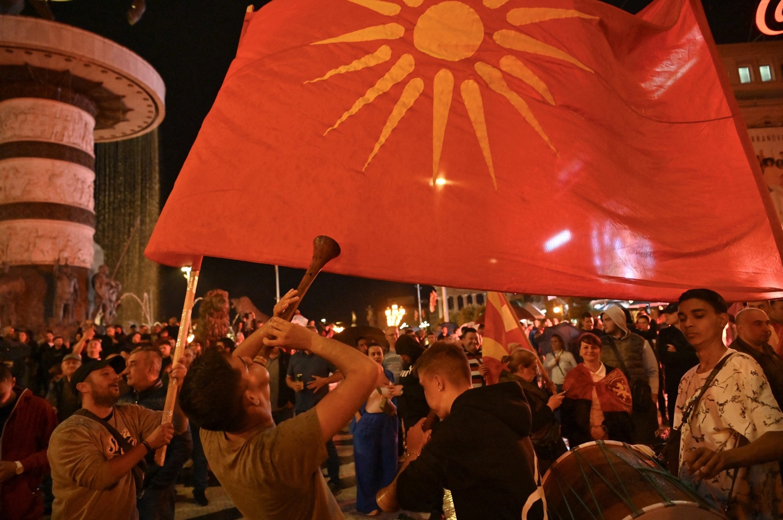 Supporters of the North Macedonian opposition party VMRO-DPMNE celebrate their party's victory in Skopje on May 8, 2024. North Macedonia appeared to be on a collision course with its EU neighbours Greece and Bulgaria, as the nationalist opposition swept parliamentary and presidential elections.,Image: 871291319, License: Rights-managed, Restrictions: , Model Release: no, Credit line: Armend NIMANI / AFP / Profimedia