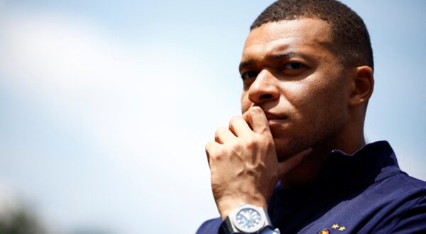French soccer player Kylian Mbappe listens to French President as he arrives for a lunch at the team's training camp, as part of the team's preparation for the UEFA Euro 2024 European football championships in Clairefontaine-en-Yvelines on June 3, 2024.,Image: 878538666, License: Rights-managed, Restrictions: , Model Release: no, Credit line: Sarah Meyssonnier / AFP / Profimedia